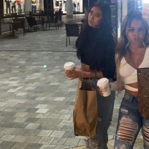 black knitted & fitted cropped turtleneck sweater